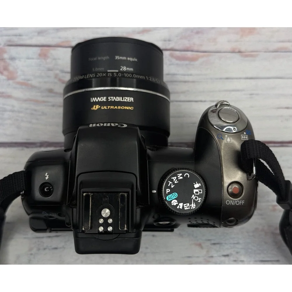Canon PowerShot SX20 IS 12.1MP Digital Camera 20x Optical Zoom Black Bundle
